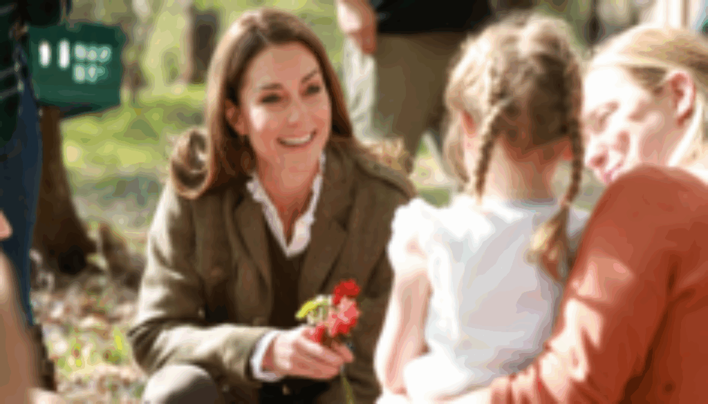 William and Kate join children on island nature trail