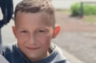 Fourteen children arrested over boy's death in fire